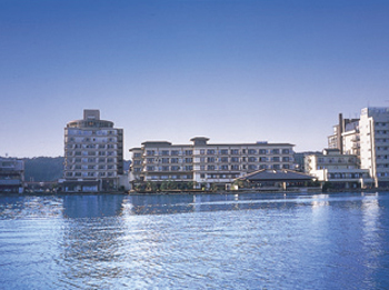 Hotel facade in summer. Hotel facade in summer.